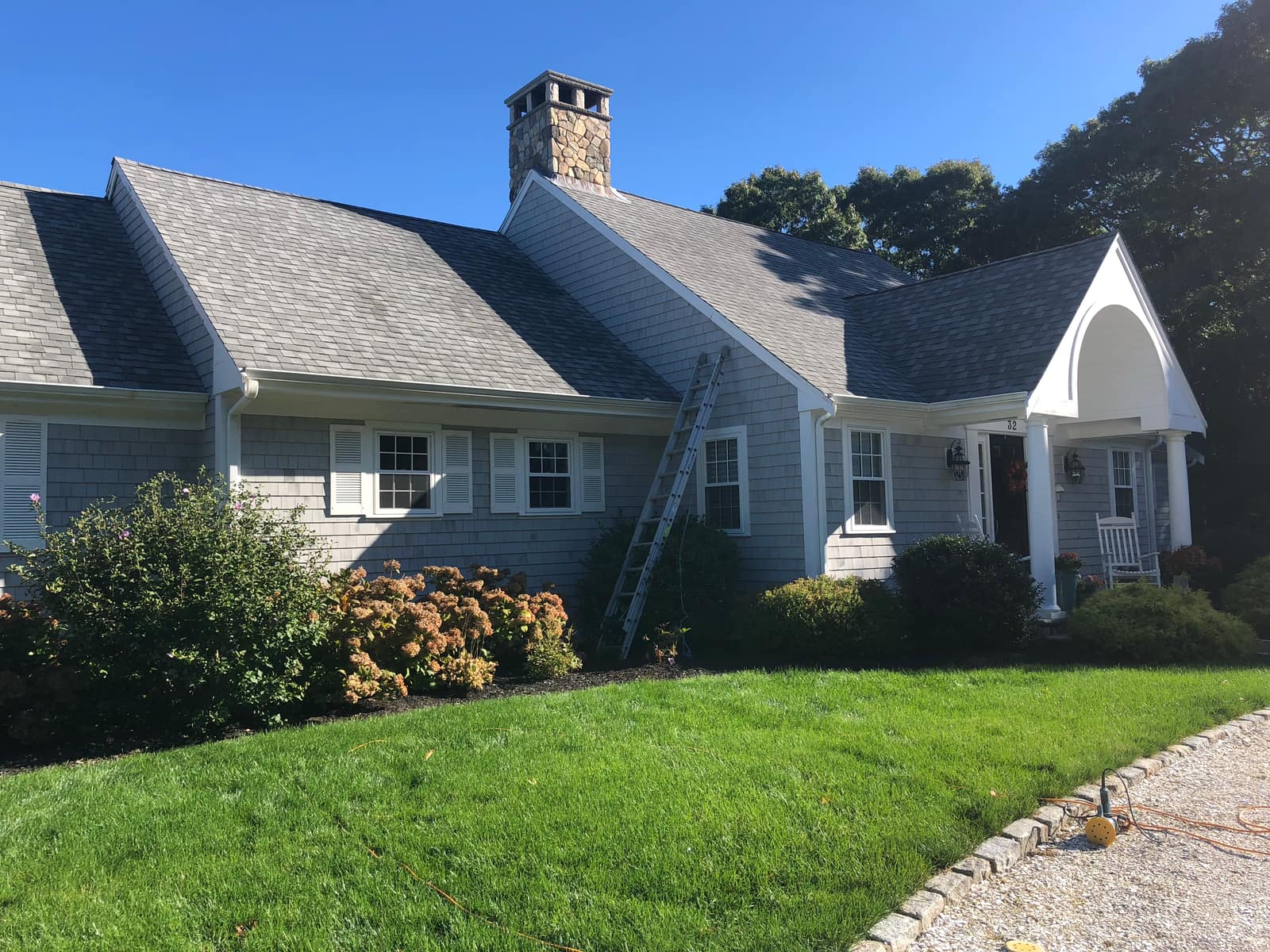 Cape Cod shingle-style home exterior repaint in Sandwich