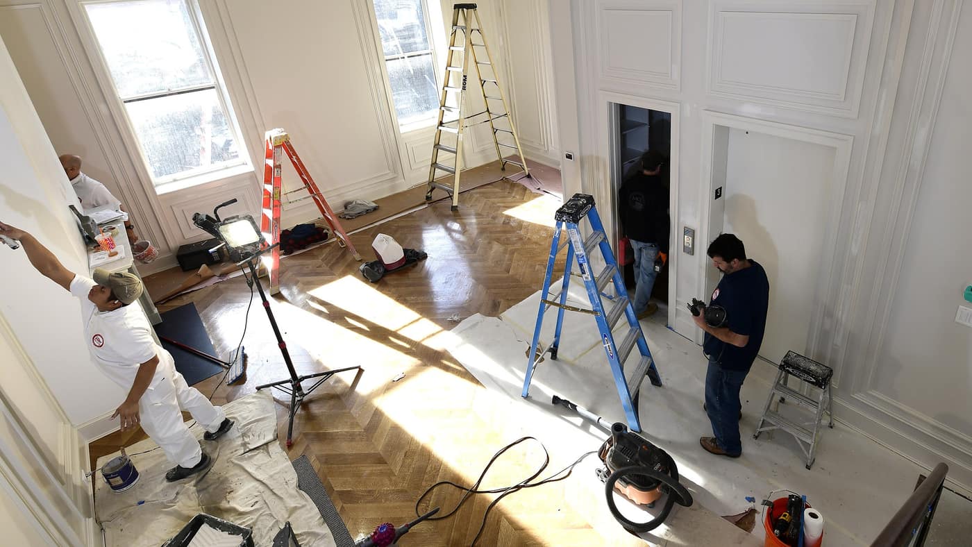 Elite Painting Services crew preparing a painted interior